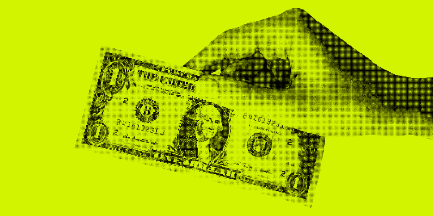 handing holding dollar bill